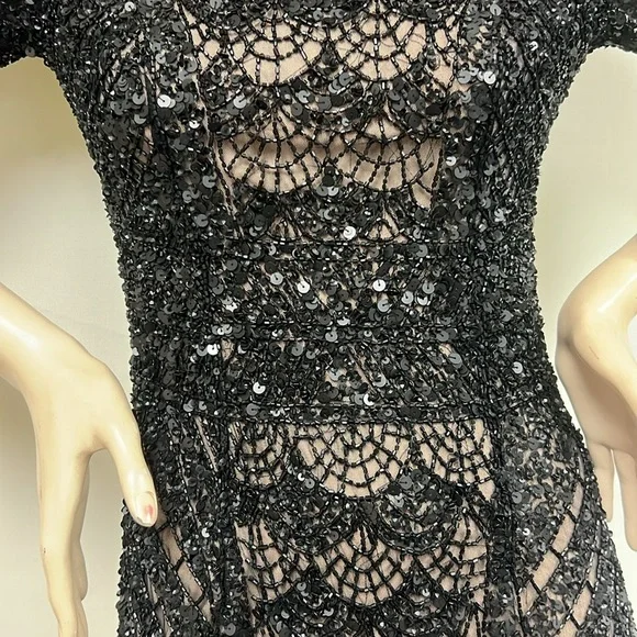 Theia beaded long sleeves V-Back midi dress - www.threedaughtersproperties.com Theia beaded long sleeves V-Back midi dress - www.threedaughtersproperties.com